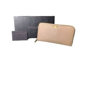 943. Prada Saffiano Champagne Zippy Wallet